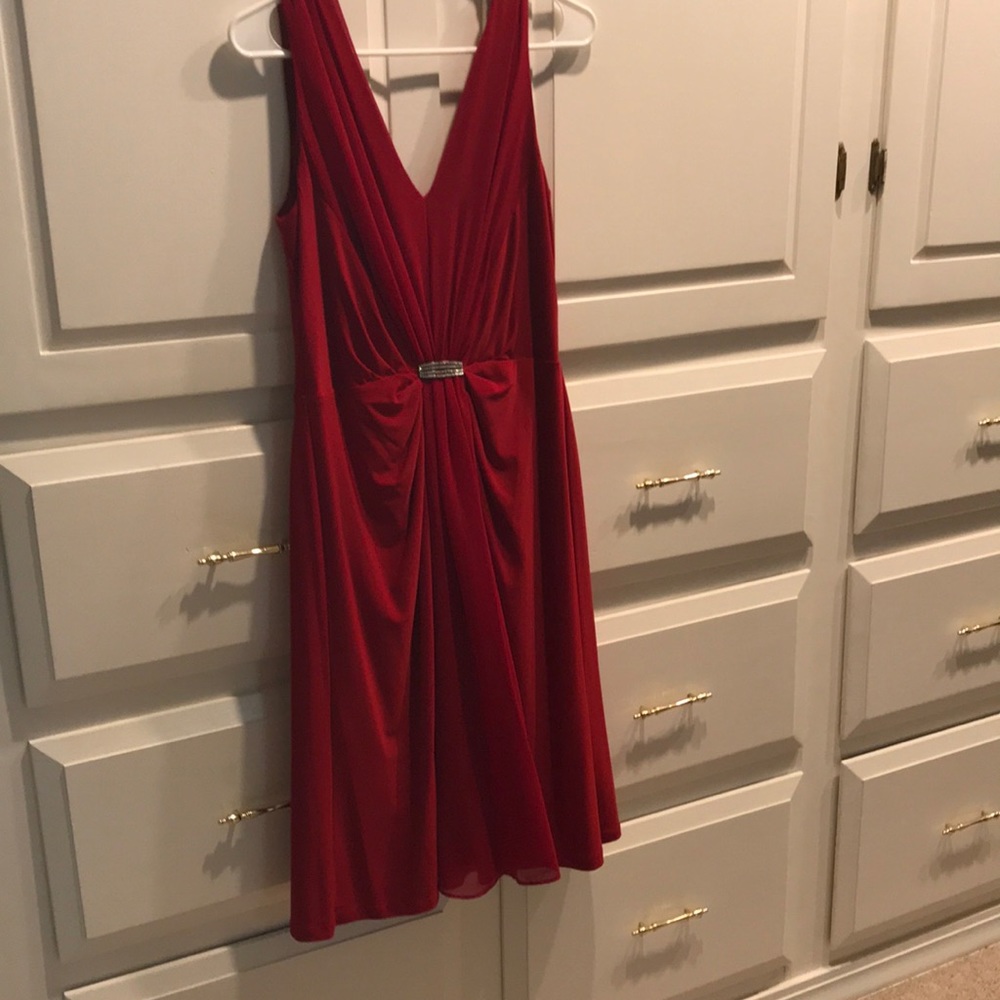 Ralph Lauren. Beautiful dress.  Very comfortable and easy to wear.  Event over.